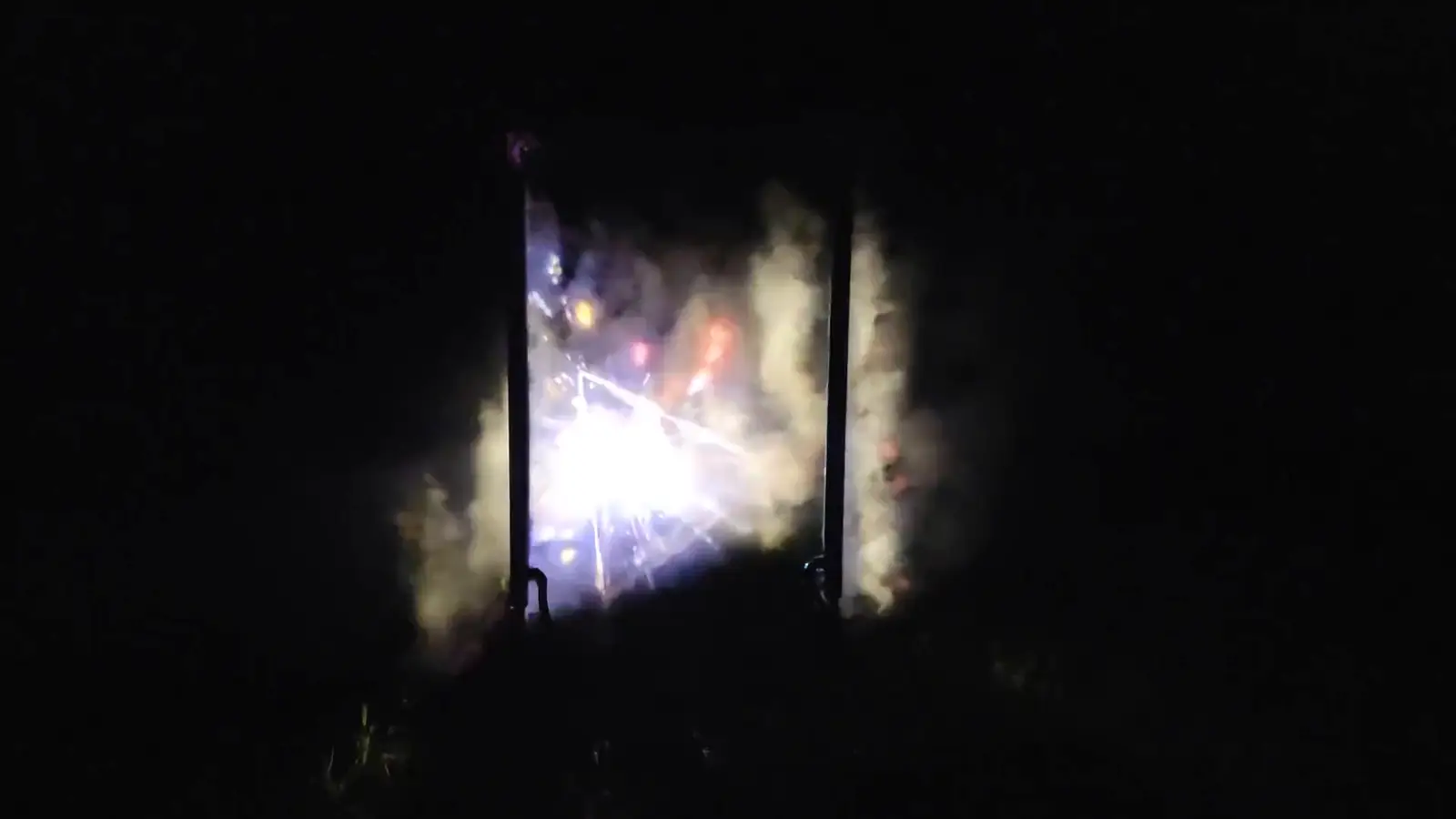 Holographic Realms installation with generative visuals projected across a fog canvas
