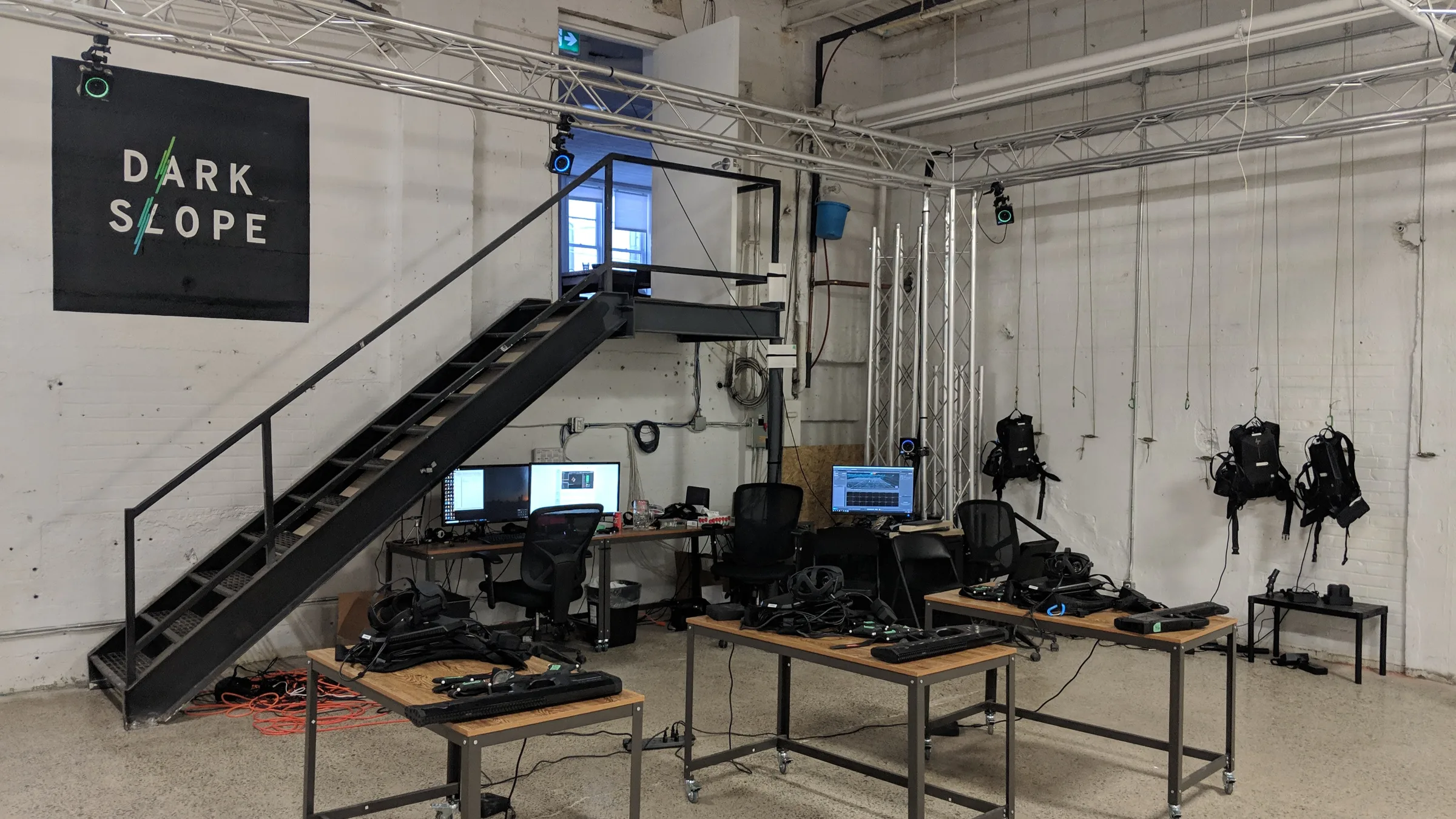 Virtual production control room with camera feeds, an LED volume and live systems monitoring